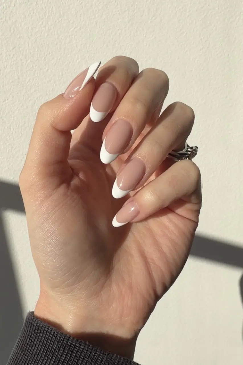 Almond French tip nails hand-done at Manicure Laundry, Toorak